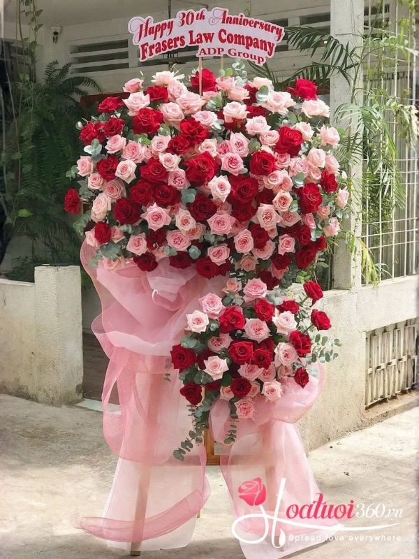 Kệ hoa tone hồng đỏ chúc mừng - Mở cửa đón lộc